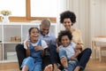 Bonding african american family having fun together at home. Royalty Free Stock Photo