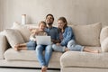 Bonding family watching funny movie on computer. Royalty Free Stock Photo