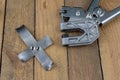 Bonding a sheet metal using a crimper. Small locksmith works in Royalty Free Stock Photo