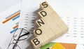 BONDS words with wooden blocks. Business concept Royalty Free Stock Photo
