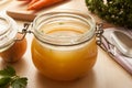 Bone broth made from chicken in a glass jar Royalty Free Stock Photo