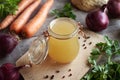 Chicken bone broth with vegetables Royalty Free Stock Photo