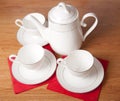 Bone china tea set on a wooden table Royalty Free Stock Photo