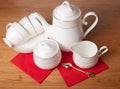 Bone china tea set on a wooden table Royalty Free Stock Photo