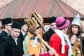 Bone crowned men on the winter ending Transylvanian traditional carnival crowd