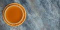 Bone meat pork broth in bowl on a dark background. Long banner format. top view Royalty Free Stock Photo