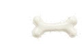 A bone of milk in the shape of a splash. Space for text. Royalty Free Stock Photo