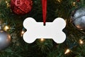 Bone Ornament Mockup Styled on a Lit-Up Christmas Tree