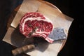 Bone In Rib Eye row Steak and knife Royalty Free Stock Photo