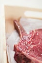 Bone-in Rib eye Steak steak on paper Royalty Free Stock Photo