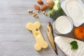 Bone shaped cheese and bone strengthening foods products, concept osteoporosis and prevention Royalty Free Stock Photo