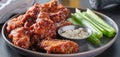 Boneless chicken wings covered in honey garlic bbq sauce with ranch and celery Royalty Free Stock Photo