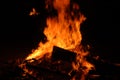 Bonfire with burning boards, large, at night in the dark. For Lag Omer Royalty Free Stock Photo