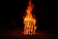 Bonfire with burning boards, large, at night in the dark. For Lag Omer Royalty Free Stock Photo