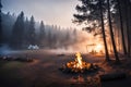 Bonfire in a camping site. misty morning