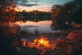Bonfire by the lakeside in the autumn evening Royalty Free Stock Photo