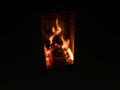 Bonfire in luxury chalet fireplace indoors