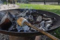 Bonfire with marshmallow.Roasting marshmallows over an open campfire Royalty Free Stock Photo