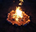 Bonfire in the night, outdoor camping in summer with guitar