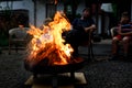 Bonfire with sparks flying around. Summer camp fire for adults and children. Royalty Free Stock Photo