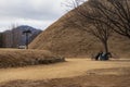 Bonghwangdae Seobongchong tombs during winter afternoon cloudy day at Gyeongju , South Korea : 10 February 2023