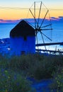 Boni\'s Windmill Mykonos town sunset sky above Aegean Sea Greece Royalty Free Stock Photo