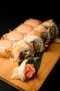 Bonito rolls adorned with tuna flakes and luscious pink cream. Royalty Free Stock Photo