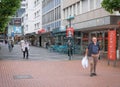 People on the street wearing masks and without masks during the second year of coronavirus in Bonn, Germany