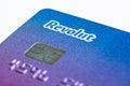 Payment card belonging to the Revolut electronic bank, isolated on white, macro shot, mobile banking.