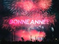 Bonne annee card on a fireworks background