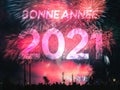 Bonne annee 2021 card on a fireworks background