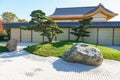 Bonsai pines (Pinus mugo or mountain pine) in dry landscaped Karesansui garden. Japanese garden in the public Royalty Free Stock Photo