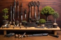 bonsai pruning tools arranged on a wooden table