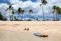 Boogie board and beach balls on a tropical beach Royalty Free Stock Photo