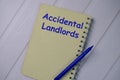 Book about Accidental Landlords isolated on wooden table
