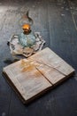 Book and ancient oil lamp Royalty Free Stock Photo