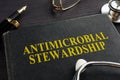 Book about Antimicrobial stewardship AMS. Royalty Free Stock Photo