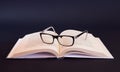 Book and apple on blank table Royalty Free Stock Photo