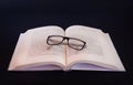 Book and apple on blank table Royalty Free Stock Photo