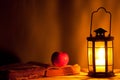 Book apple and lantern Royalty Free Stock Photo
