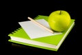 Book,apple,paper and pencil