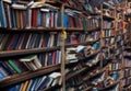 Book background. Selective focus. Blurred texture of old books. Bookshelves in the library