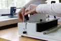 Book Binding Machine Operator. Work with Book binding machine Royalty Free Stock Photo