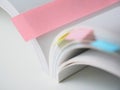 White Book With colorful Bookmarks