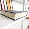 Book on bookshelf isolated on white background Royalty Free Stock Photo