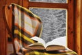 Book on a chair in winter Royalty Free Stock Photo