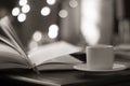 Book and coffee with magic bokeh background