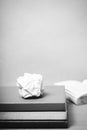 Book and crumpled paper black and white color tone style Royalty Free Stock Photo