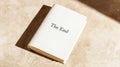 Book displaying The End on final page, symbolizing conclusion, finish, closing a chapter, completion Royalty Free Stock Photo