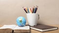 Book and earth ball with color pencil Royalty Free Stock Photo